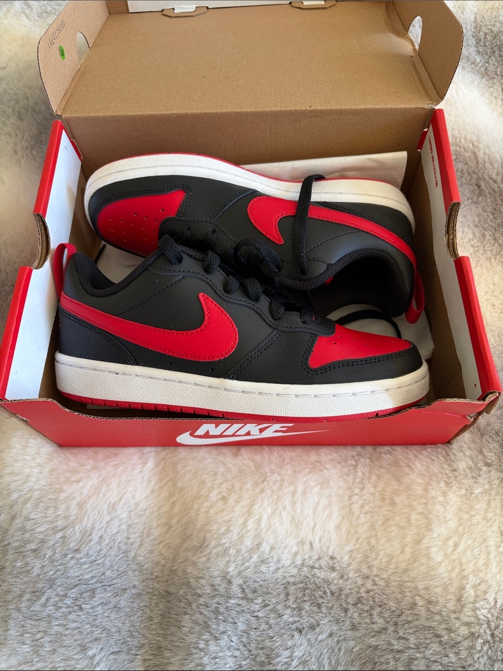 Nike Kids Black and Red Low Top Swoosh Sneakers